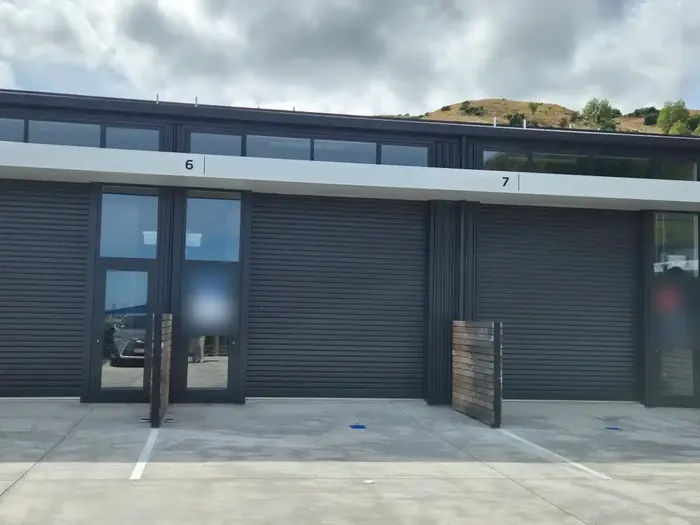 Units 6 and 7 from the carpark, with the hills behind