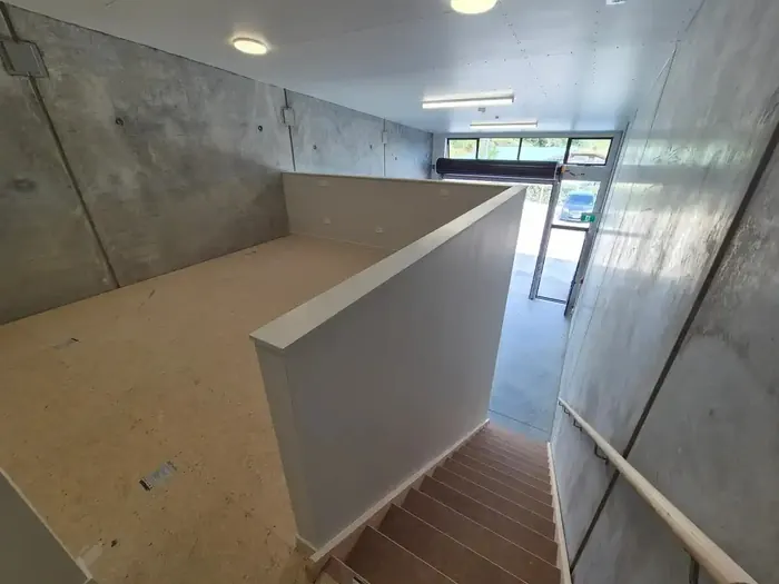Stairs up to the mezzanine